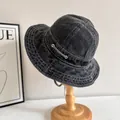 Detail of washed denim bucket hat with contrast stitching and adjustable chin strap - M (56-58cm) / Black