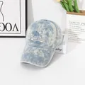 Berretto da baseball in denim tie-dye con ricamo Australia su libri bianchi - M / Azzurro
