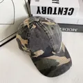 Detail view of the camouflage baseball cap with tactical embroidery and ventilation eyelets - M (56-58cm) / Army Green & Black Camouflage