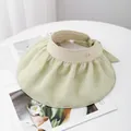 Detail of light green pleated brim sun hat with straw crown and bow-knot fastener - M (56-58cm) / Light Green