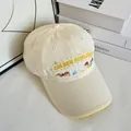 Close-up of cute mushroom and letter embroidery on cream cotton baseball cap - M (56-58cm) / Beige