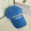 Detail of the blue canvas baseball cap with delicate mushroom and floral embroidery - M (56-58cm) / Blue