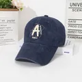 Detailed shot of dark blue washed denim baseball cap with vintage A embroidery and text - M (56-58cm) / Navy Blue