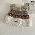 Detail of bear ears knit hat with plush rim and decorative woven stripe patterns - M (56-58cm) / Beige And Deep Purple