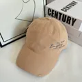 Detail of khaki quick-dry baseball cap featuring side letter embroidery and frayed edges - M / Khaki
