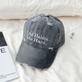 Detail of distressed baseball cap with embroidery on textured grey washed canvas fabric - M(56-58cm) / Gray