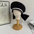 Sweet sailor style black beret with white stripes and large bow on model head display - M / Black