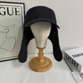 Cappello da aviatore vintage nero con paraorecchie e tessuto testurizzato su bianco - M / Denim Nero