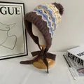 Fair Isle knit trapper hat with pom-poms and warm earflaps in vintage brown and blue - M / Coffee