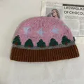 Jacquard-Strickmütze aus Wolle mit rosa Vogelmuster und Rippstrick für warme Wintertage - M (56-58cm) / Rosa