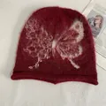 Deep burgundy knit beanie with white butterfly pattern and warm mohair texture - M (56-58cm) / Burgundy