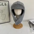 Detailed texture of grey knit trapper hat with earflaps and plush wool boucle yarn - M / Gray