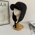 Winter cotton linen trapper hat with warm ear flaps and adjustable chin strap in black - M (56-58cm) / Black