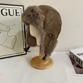 Detailed close-up of brown PU leather aviator hat featuring plush grey faux fur lining - M (56-58cm) / Khaki