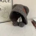 Detail of dark grey plush teddy fleece bear ear hat with pom-pom ties and leather tag - M (56-58cm) / Gray