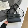 Classic black crossbody bag with V-pattern panel and metallic silver twist lock clasp - Black without Pendant