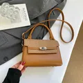 Elegant caramel brown crossbody bag with woven texture flap and metallic twist lock - Brown No Pendant