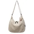 Beige crescent tote bag for women featuring a plush bear charm and adjustable drawstring - Cream White with Pendant