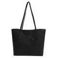 Minimalistische schwarze strukturierte Tote-Bag mit langen Trägern und großem Volumen - Schwarz
