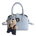 Borsa a mano azzurra a conchiglia con chiusura a scatto e ciondolo a orsetto - Blu con ciondolo