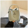 Chic light blue bucket bag with lychee texture and silver twist lock detail - No Pendant / Blue