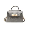 Silver textured faux snake skin crossbody bag with gold-tone buckle and round handle - Gray