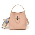 Pink pebbled leather bucket bag with silver cross-lock and cute bear charm pendant - With Pendant / Pink
