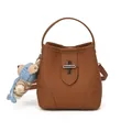 Brown lychee leather bucket bag with metal cross buckle and bear charm accessory - With Pendant / Brown