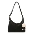 Black minimalist nylon crossbody bag with adjustable strap and plush cloud charm - Black