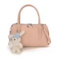Pink lychee texture crossbody bag with silver zippers and a white plush bunny charm - With Bunny Pendant / Pink
