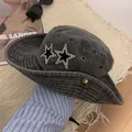 Detail of star rhinestone patches and metal eyelets on a dark grey denim sun hat - M (56-58cm) / Black