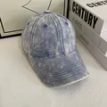 Vintage gewaschene blaue Denim-Baseballkappe mit Distressed-Details und breiter Krempe - M (56-58cm) / Hellblau