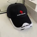 Macro shot of embroidered logo and distressed two-tone brim on the black baseball cap - M (56-58cm) / Black