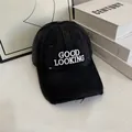 Close-up of white 'GOOD LOOKING' embroidery on a black distressed vintage baseball cap - M(56-58cm) / Black