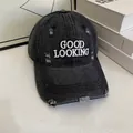 Close-up of white letter embroidery and vintage distressed details on denim baseball cap - M(56-58cm) / Gray