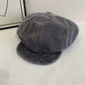 Detailed texture of dark grey washed denim newsboy cap with vintage stitching accents - M / Gray