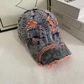 Gorra de béisbol de mezclilla vintage con forro naranja y detalles rotos estilo calle - M / Azul Oscuro/Forro Naranja