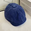 Nahaufnahme der blauen Cord-Schirmmütze im Vintage-Stil mit Fokus auf Stoffstruktur - M / Blau