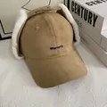 Detailed texture of khaki suede baseball cap with plush earflaps and Warmth embroidery - M (56-58cm) / Khaki