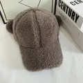 Detailed macro view of plush lamb wool texture and cute pom-pom ears on a brown baseball cap - M (56-58cm) / Gray