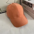 Detailansicht einer orangefarbenen Baseballkappe aus Canvas mit 6-Panel-Konstruktion - M (56-58cm) / Orange