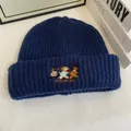 Close-up of cute dog embroidery and JOIN MY JOY slogan on navy ribbed knit beanie - M / Navy Blue
