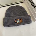 Close-up of dark grey ribbed beanie with cartoon puppy embroidery and Join My Joy text - M (56-58cm) / Dark Gray