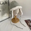 Winter aviator hat in sage green with white plush lining and ear flaps protection - M (56-58cm) / Green