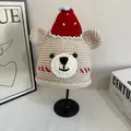 Detailed close-up of a handmade bear knit hat with a festive red pointed cap and soft texture - M(56-58cm) / Off White