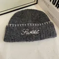 Detailed close-up of dark grey mohair beanie featuring white Sweet letter embroidery - M(56-58cm) / Dark Gray