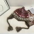 Vintage gebreide muts met oorkleppen, pompon en Fair Isle-patronen in Noorse stijl - M (56-58cm) / Grijs