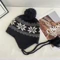 Detailed knit of Nordic snowflake pattern on ear-flap hat with warm plush pom-pom - M / Black