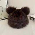 Detail view of leopard print faux fur hat with plush bear ears on a white surface - M(56-58cm) / Coffee