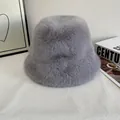 Detailed close-up showing soft grey faux fur texture on a plush bucket hat surface - M (56-58cm) / Haze Blue